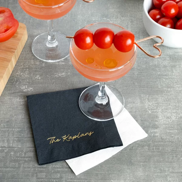 handwritten script family name, cocktail napkin