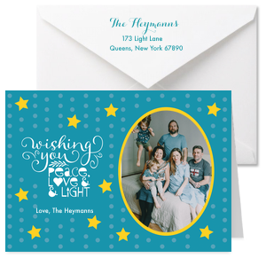 Wish your family peace, love, and light with this custom Christmas Card! Personalize this starry Christmas card with your family name and a photo. 