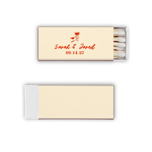 Ignite the spark of your wedding day with the Toasting Hands Wedding Matches, featuring an endearing illustration of a cartoon hand with a glass of wine raised in a celebratory toast. Below the image, the couple's names are elegantly written in a charming script, with the event date thoughtfully placed in a classic serif font. These matches are a delightful memento of your union.