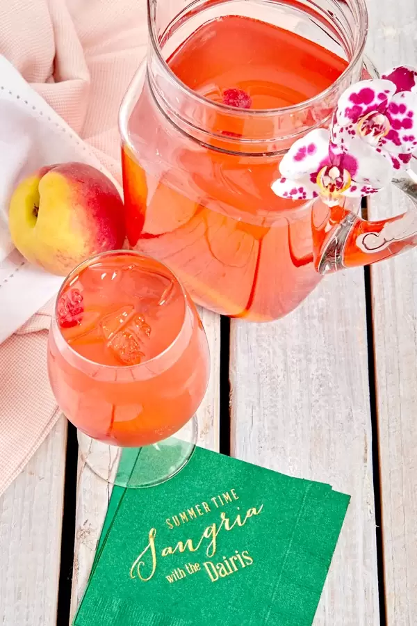 Rosè Peach Sangria with personalized cocktail napkin