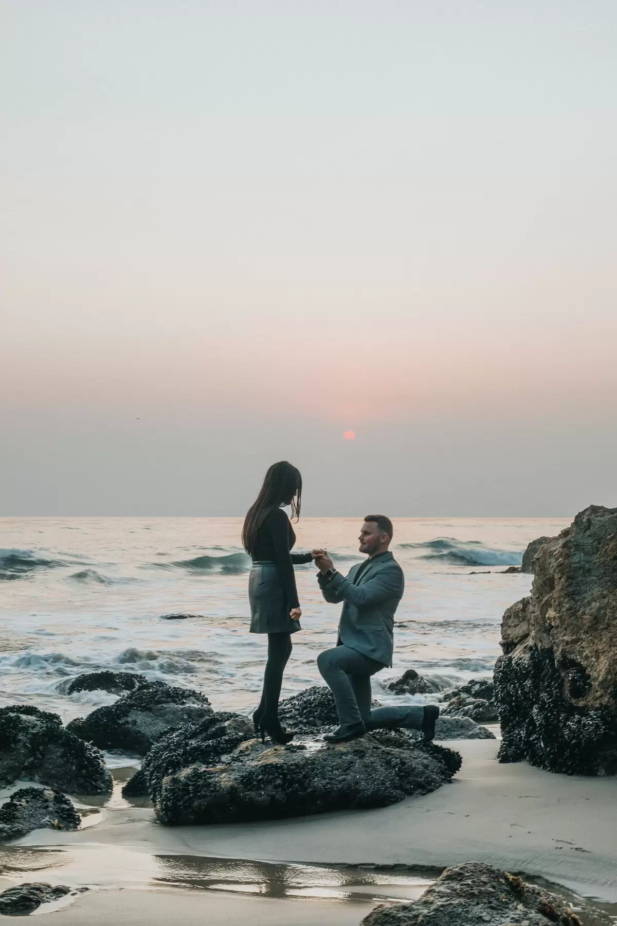 sunset beach proposal photo by Nathan Dumlao