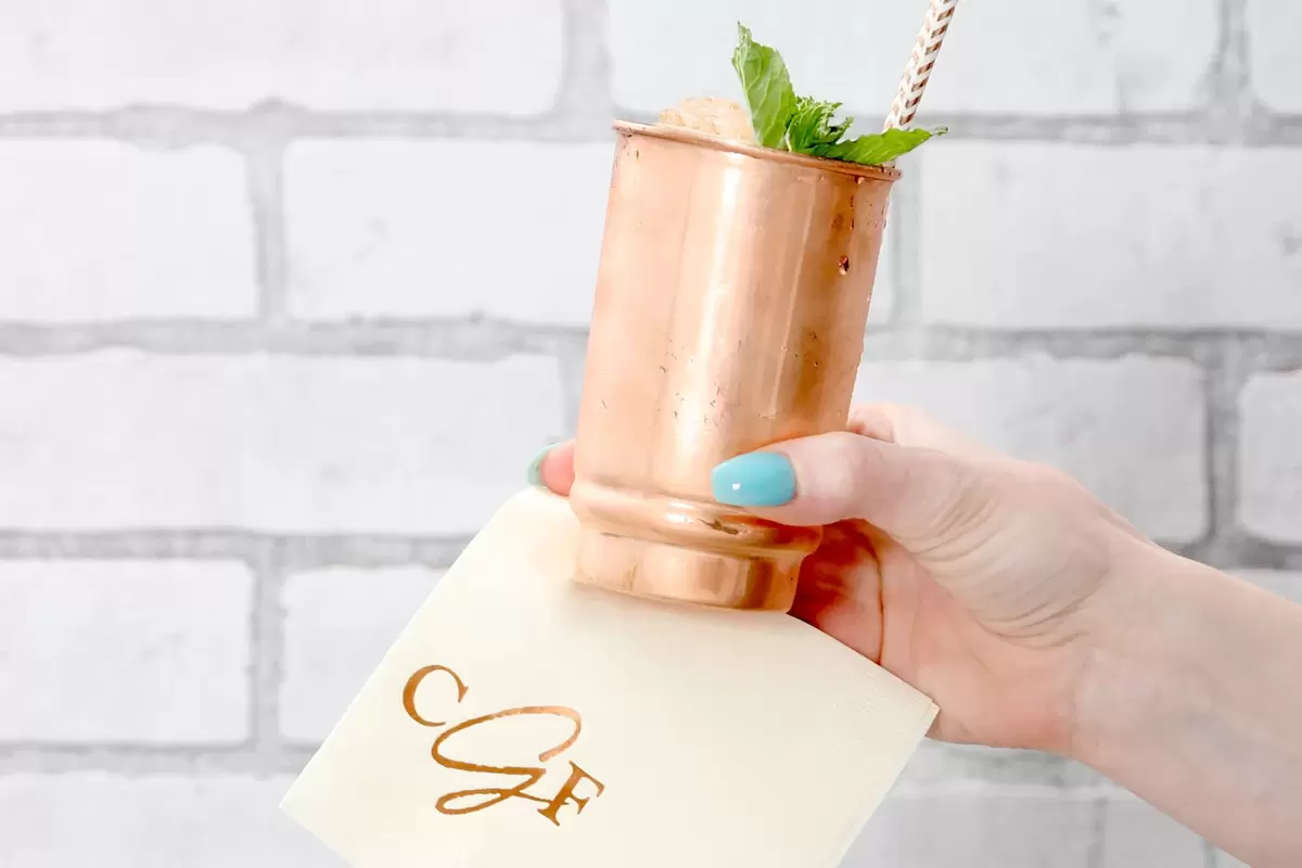 custom designed wedding cocktail napkins used with copper cup