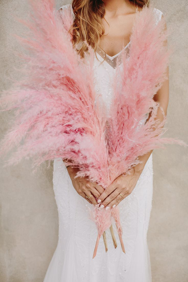 bright pink pampas grass bride bouquet