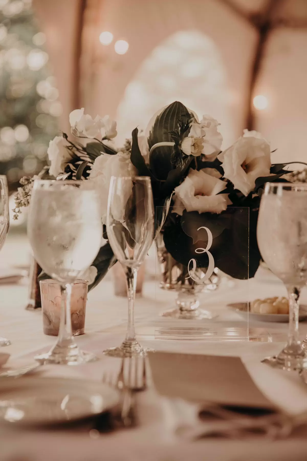 acrylic table number at glamorous all white wedding reception