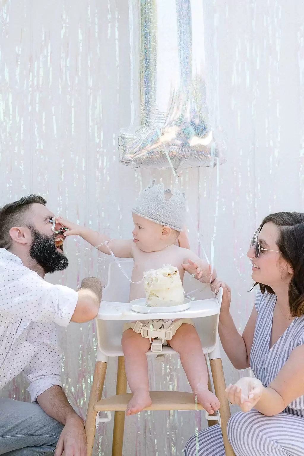 Arlo and his parents at his sky themed birthday party