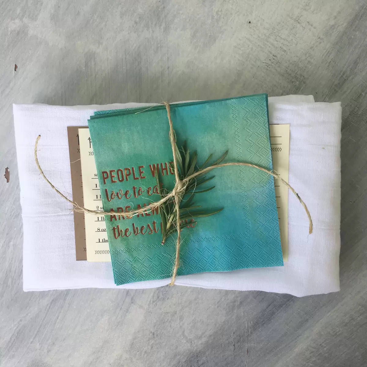 custom watercolor cocktail napkin and recipe cards for personalized party favors at a kitchen bridal shower