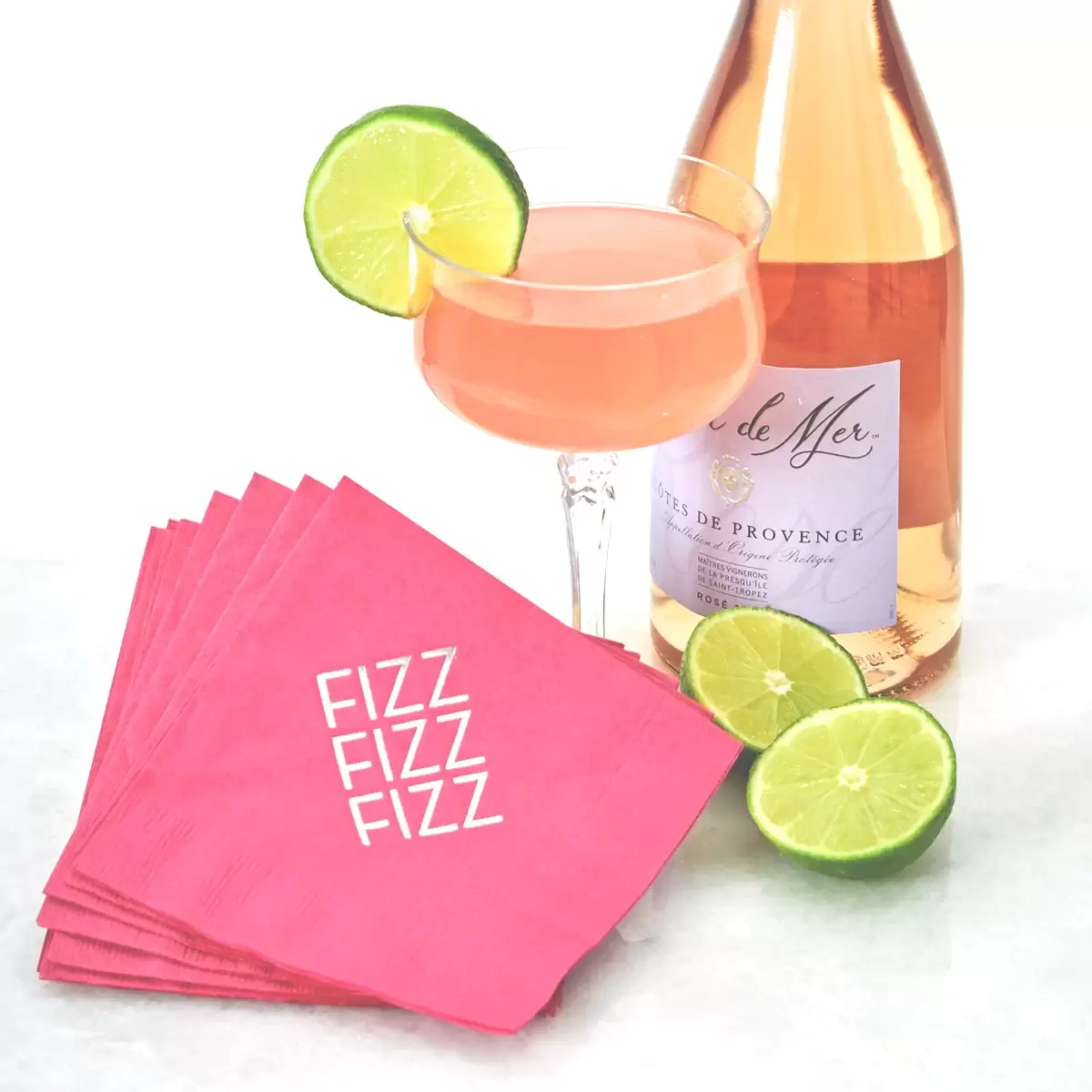 Rosè Cosmo cocktail recipe with personalized cocktail napkin