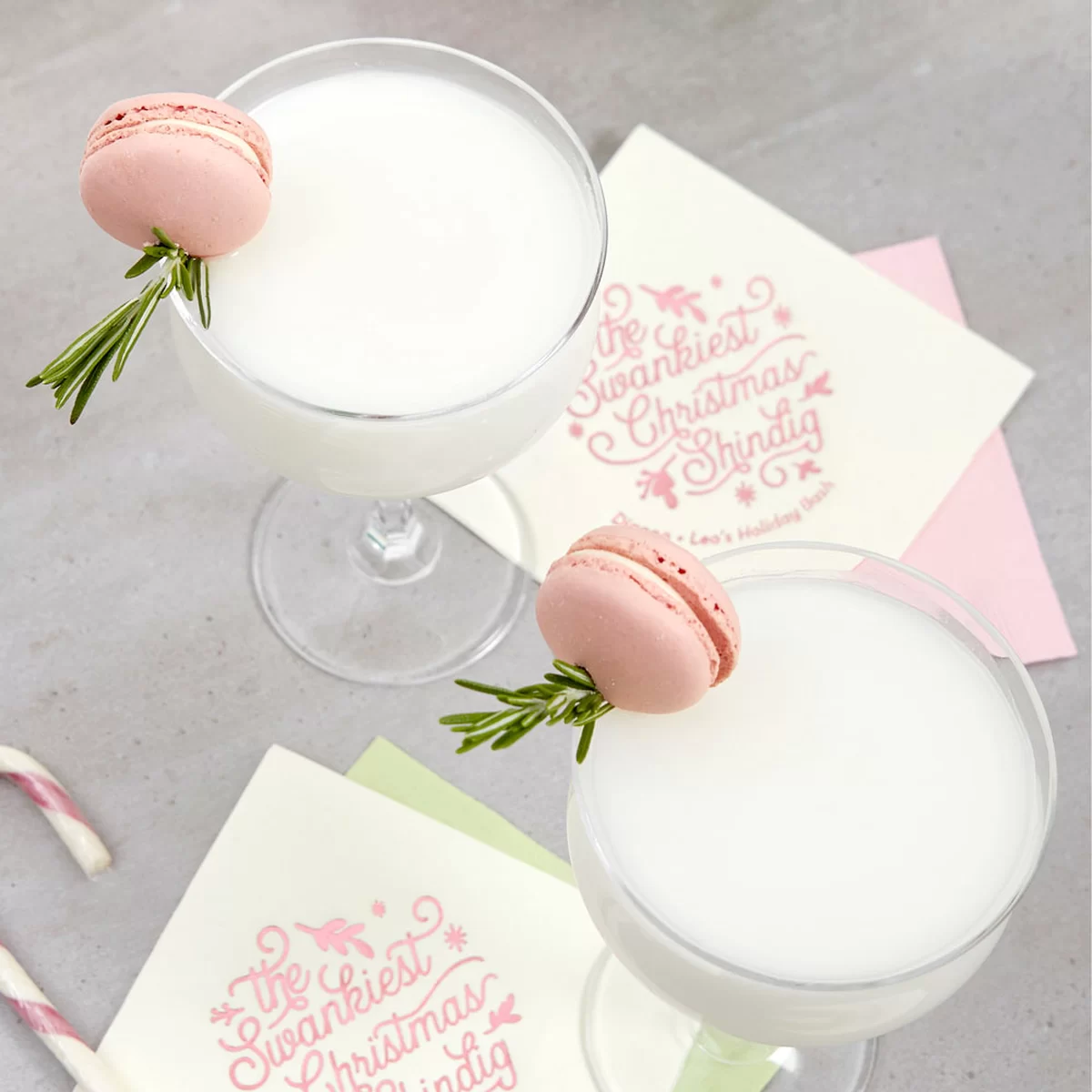 creamy rum cocktail recipe with rose syrup and a custom cocktail napkin