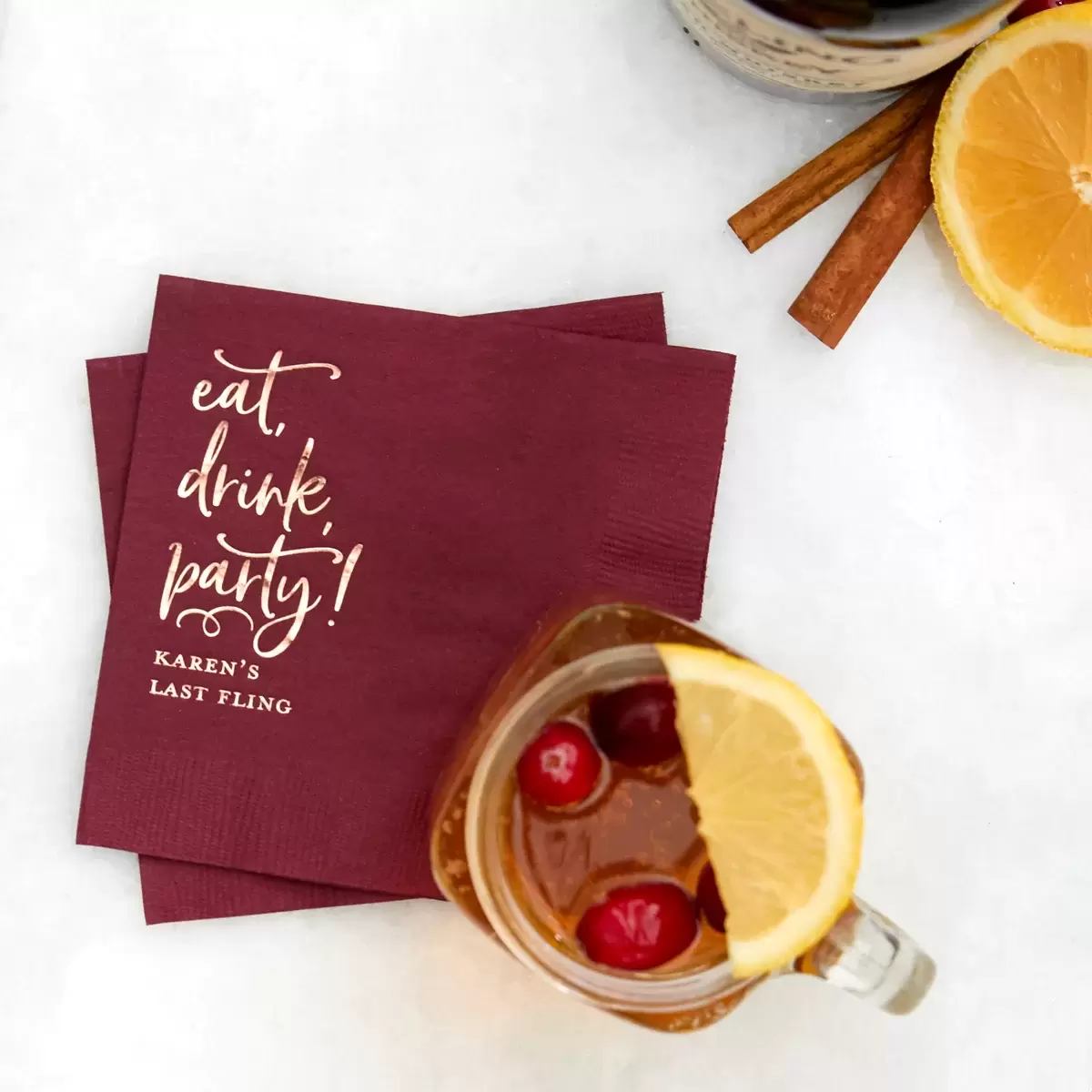 Holiday Whiskey Toddy cocktail recipe with personalized cocktail napkin