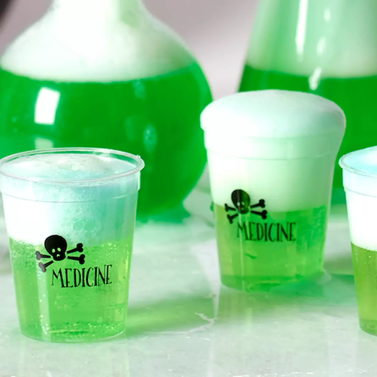 Use custom Halloween shot glasses as a fun small scale serving of yummy mocktail drinks for kids!